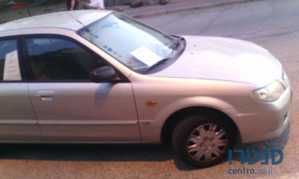 2002' Mazda 323 photo #1