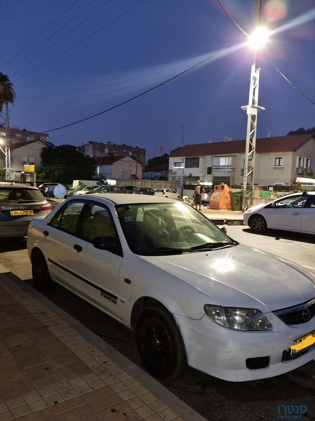 2004' Mazda 323 מאזדה לאנטיס photo #4
