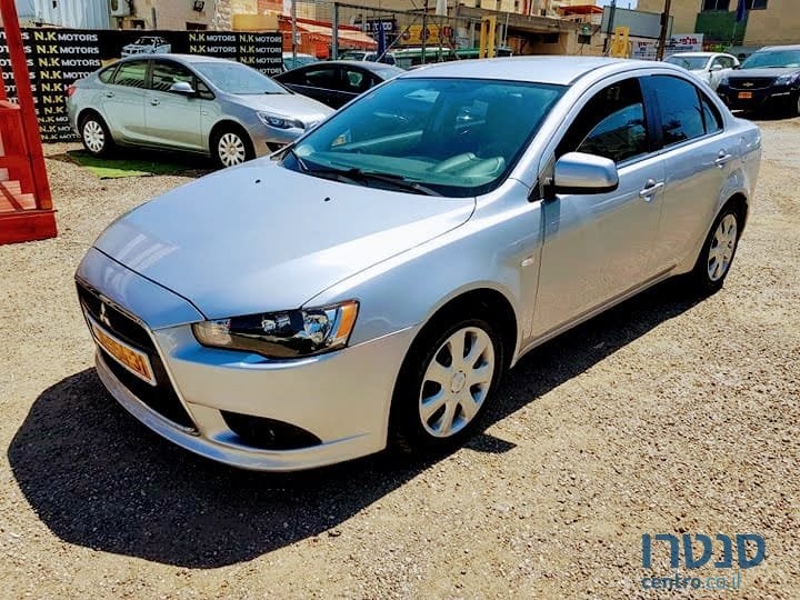 2014' Mitsubishi Lancer X photo #1