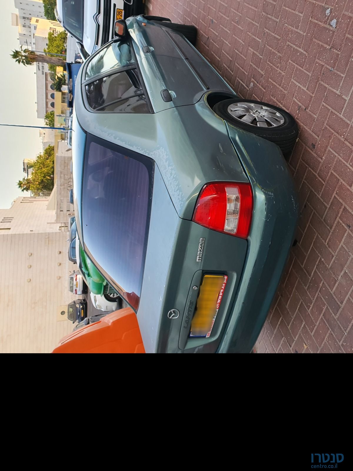 2002' Mazda 323 מאזדה 323 לאנטיס photo #1