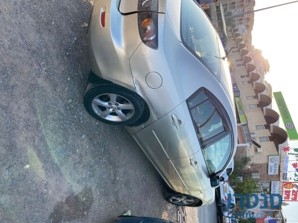 2004' Mazda 3 photo #1