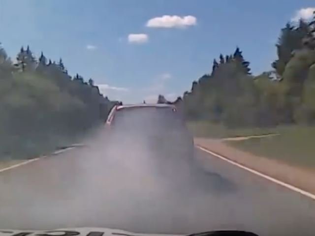 Insane Volvo Driver Uses Spikes And Smoke Screen To Evade Police