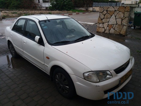 2000' Mazda 323 photo #1