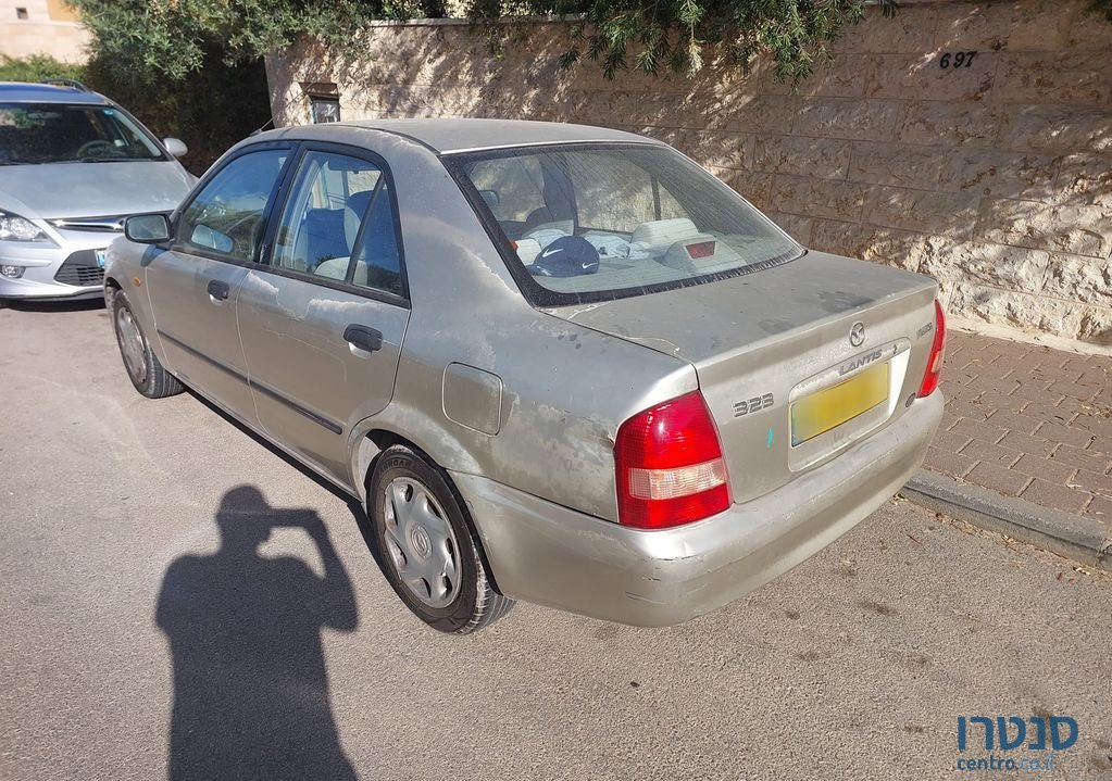 2003' Mazda 323 מאזדה לאנטיס photo #5