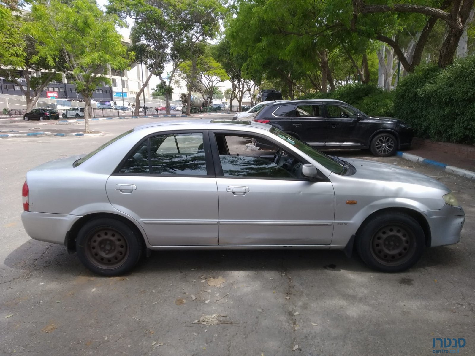 2002' Mazda 323 מאזדה לאנטיס photo #3