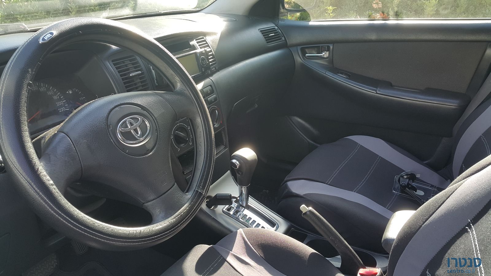 2003' Toyota Corolla photo #1