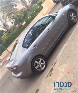 2004' Mazda 3 photo #1