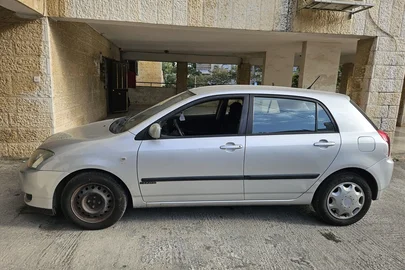 2003' Toyota Corolla טויוטה קורולה