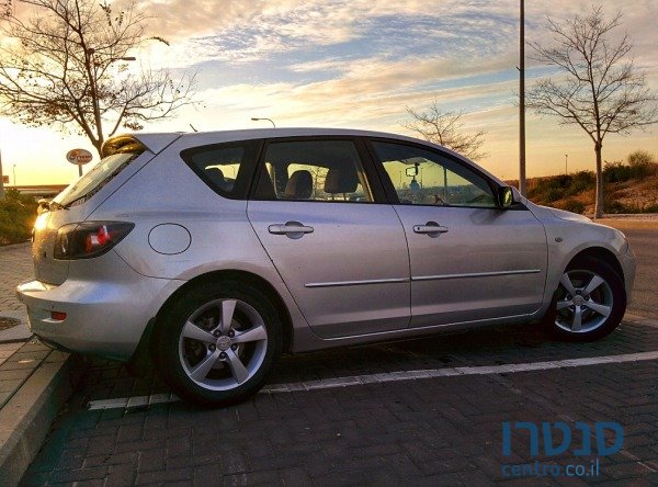 2004' Mazda 3 photo #1