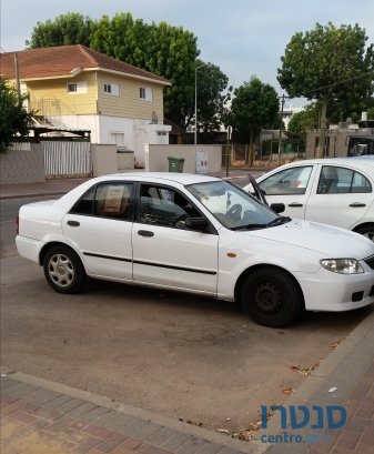 2003' Mazda 323 photo #1