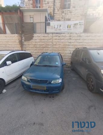 2002' Mazda Demio מאזדה דמיו photo #1