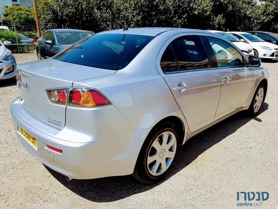 2014' Mitsubishi Lancer X photo #2