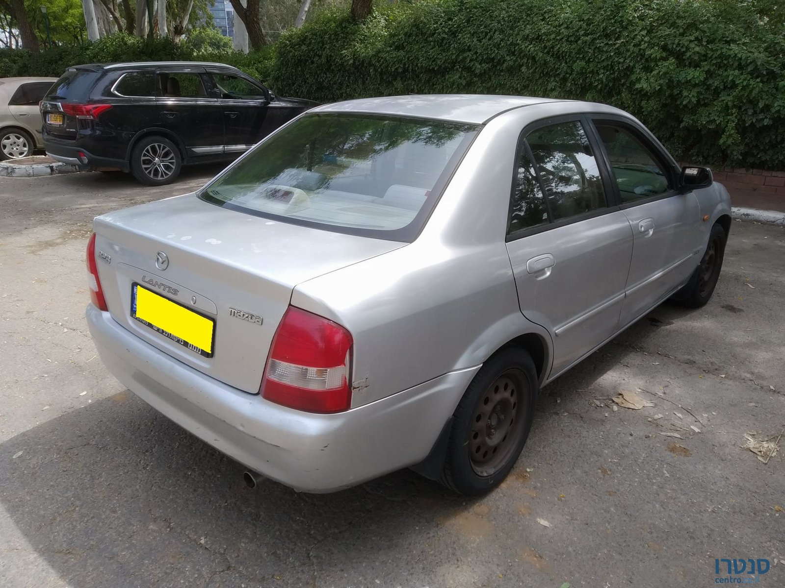 2002' Mazda 323 מאזדה לאנטיס photo #1