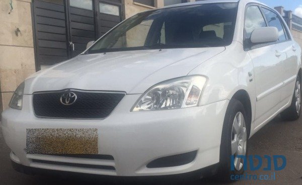 2004' Toyota Corolla photo #1