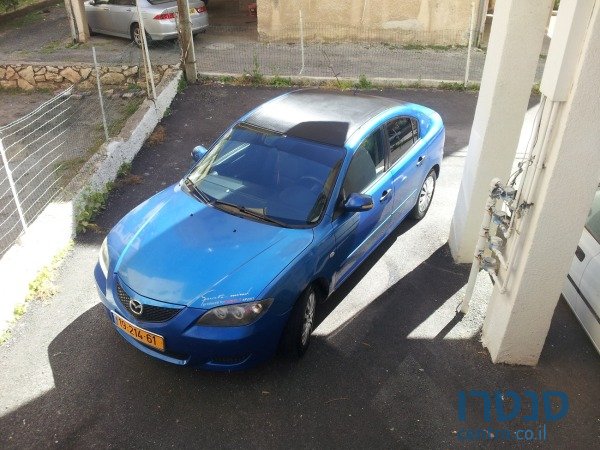 2007' Mazda 3 photo #1