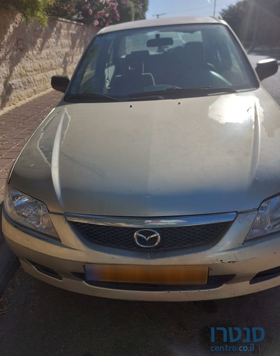 2003' Mazda 323 מאזדה לאנטיס photo #6