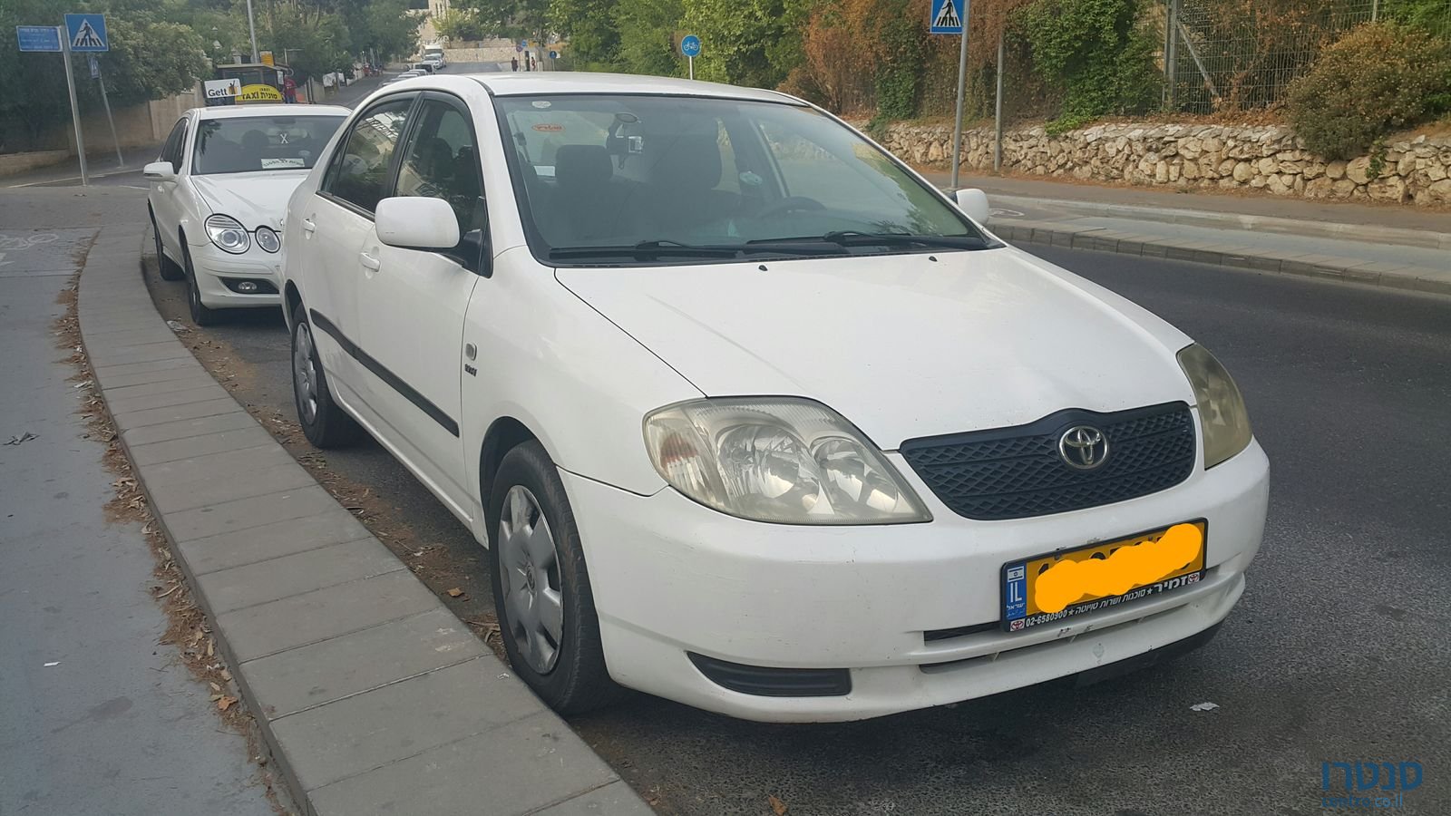 2003' Toyota Corolla photo #2