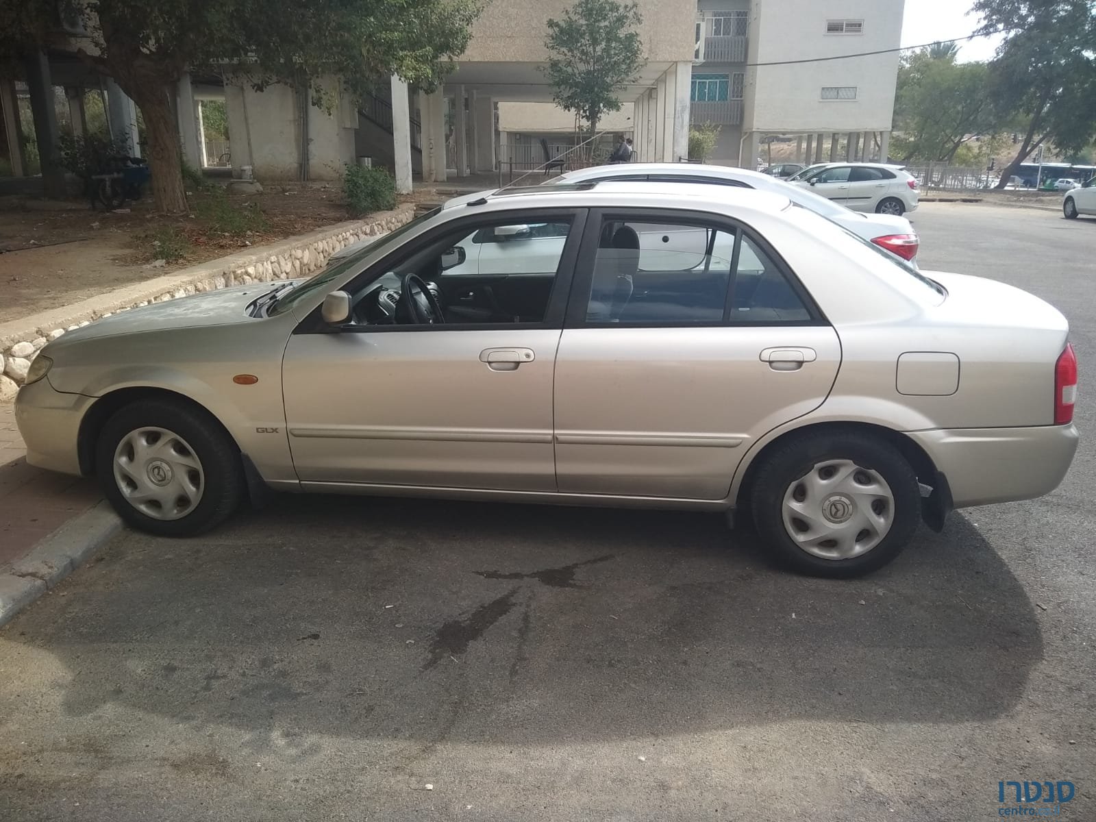 2003' Mazda 323 Премиум photo #1