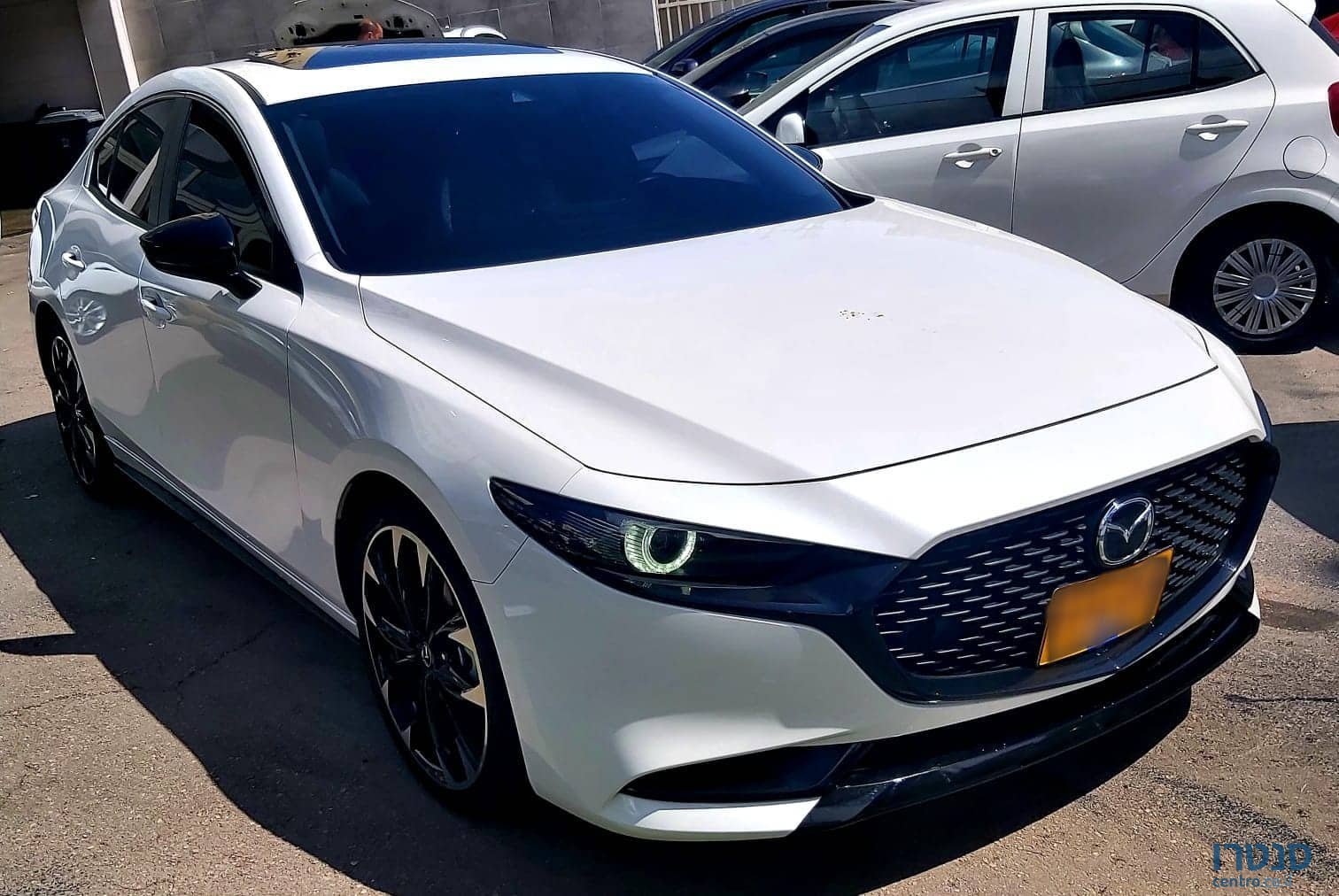 2020' Mazda 3 photo #1