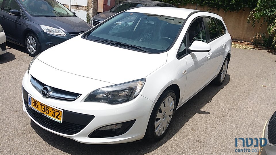 2014' Opel Astra photo #1