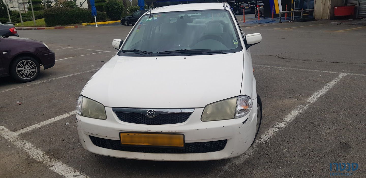 1999' Mazda 323 מאזדה לאנטיס photo #1