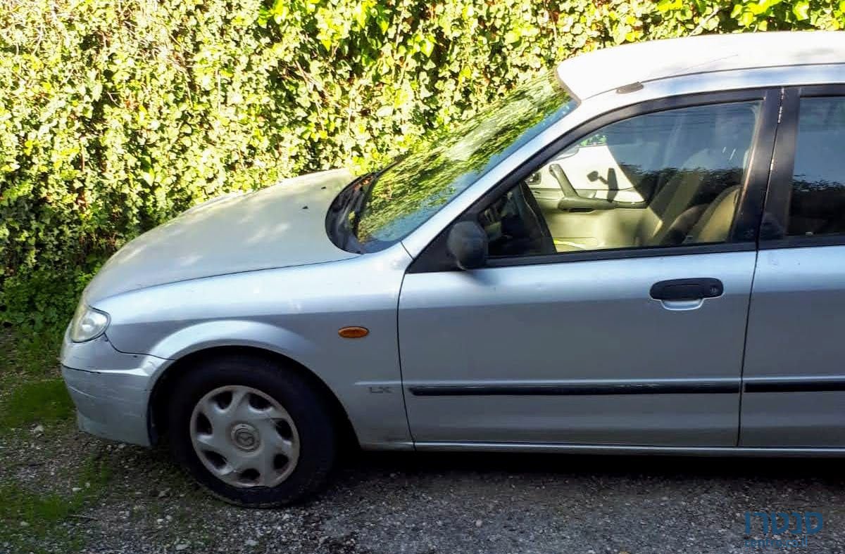 2004' Mazda 323 מאזדה לאנטיס photo #3