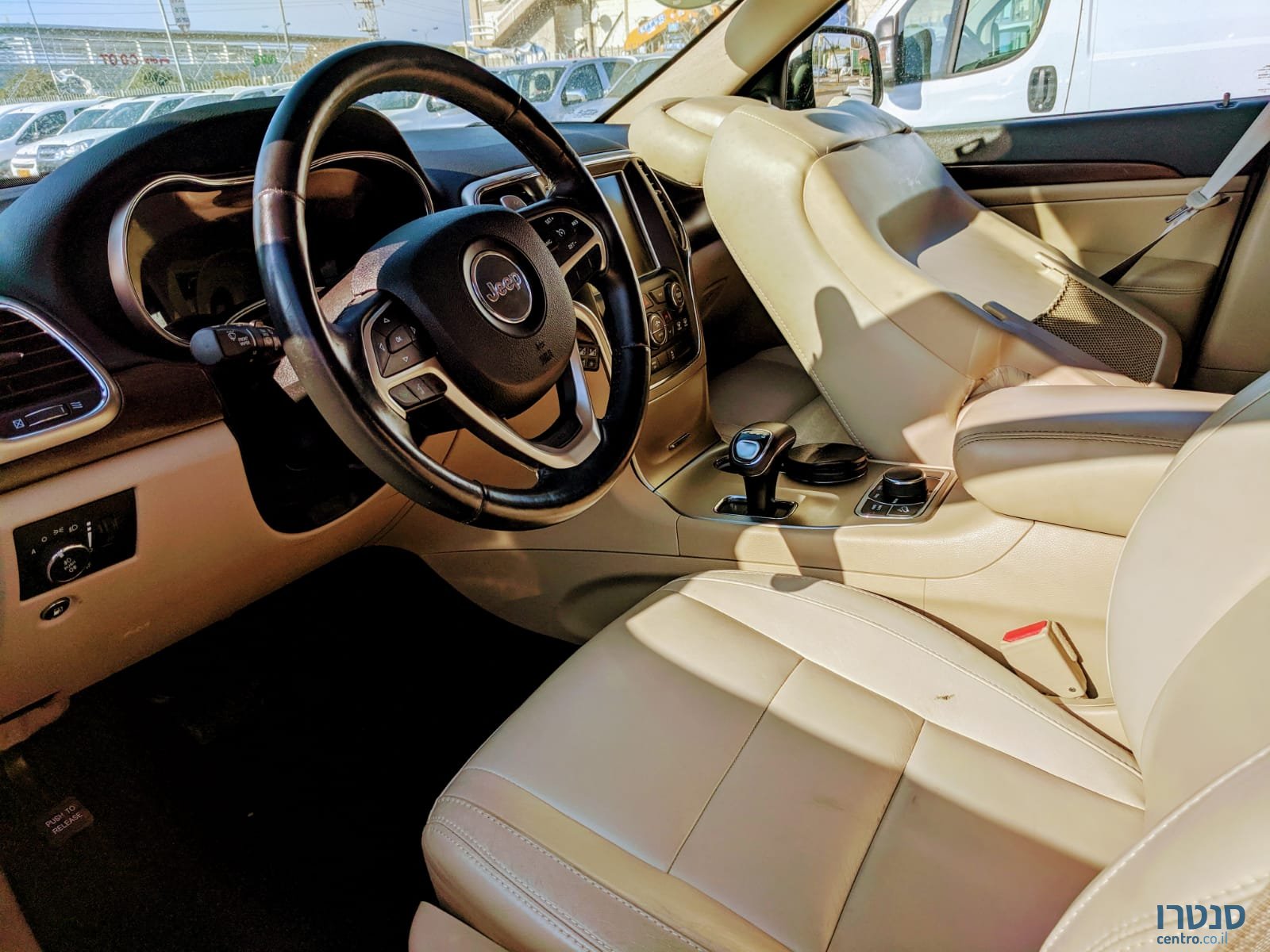 2016' Jeep Grand Cherokee photo #3