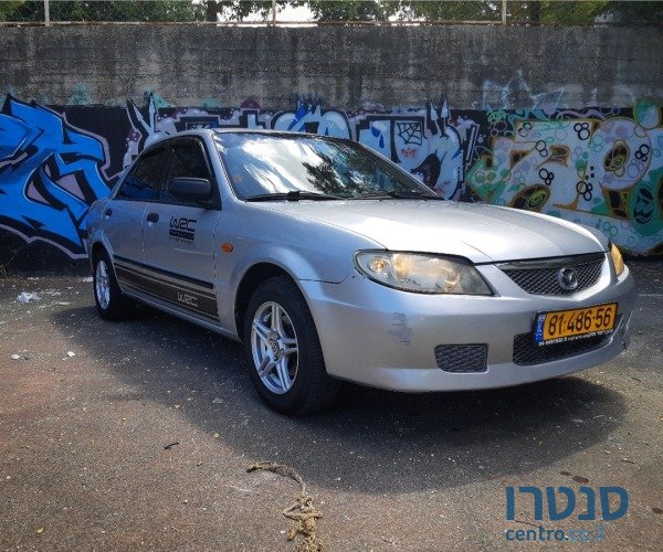 2004' Mazda 323 photo #1