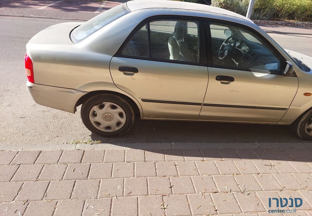 2003' Mazda 323 מאזדה לאנטיס photo #2