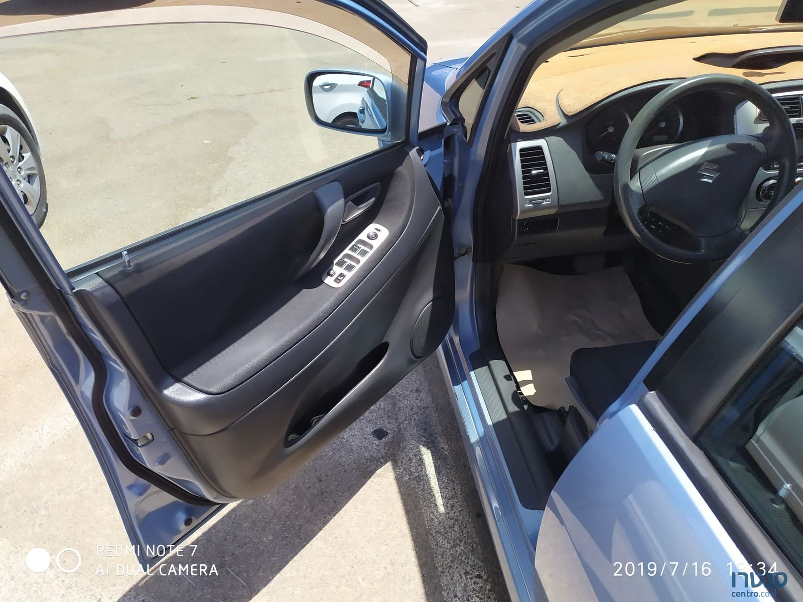 2004' Suzuki Liana photo #1