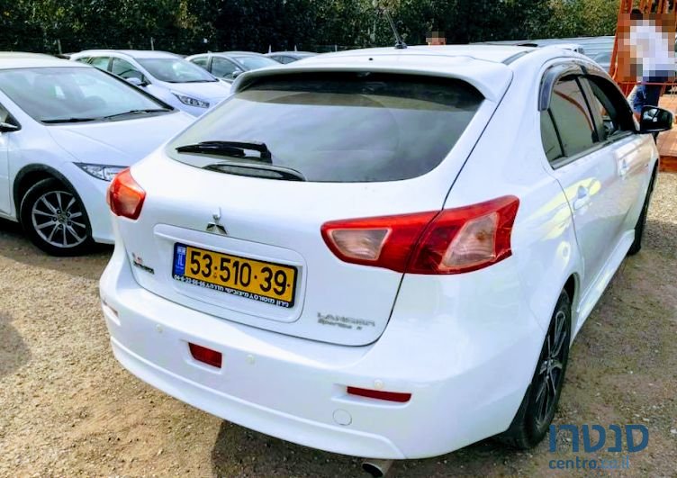 2014' Mitsubishi Lancer X Sportback photo #2