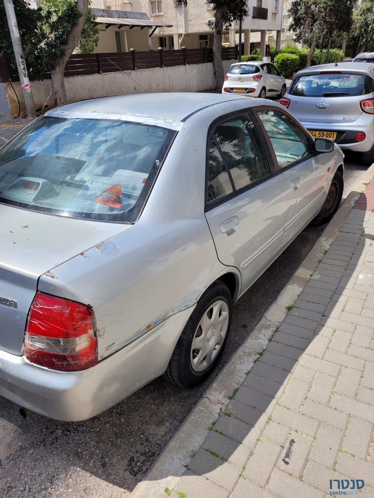 2000' Mazda 323 מאזדה לאנטיס photo #5