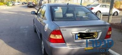 2004' Toyota Corolla photo #1