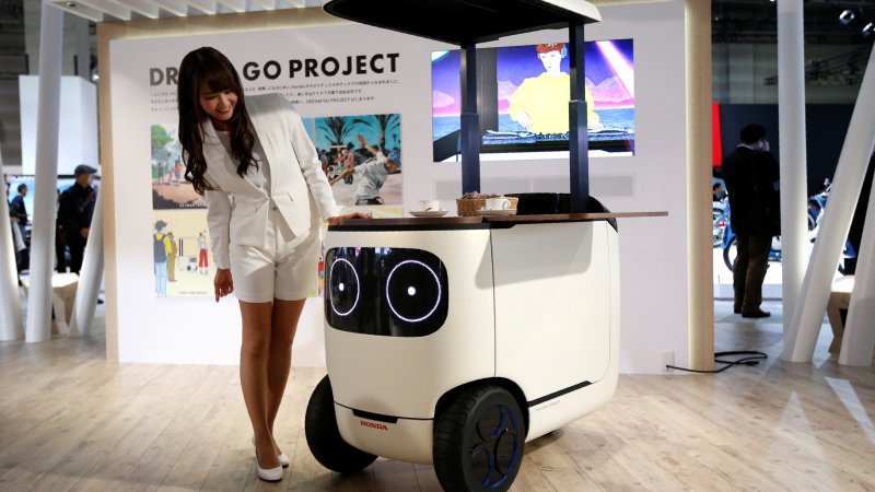Honda's cutesy robot cooler keeps drinks within reach