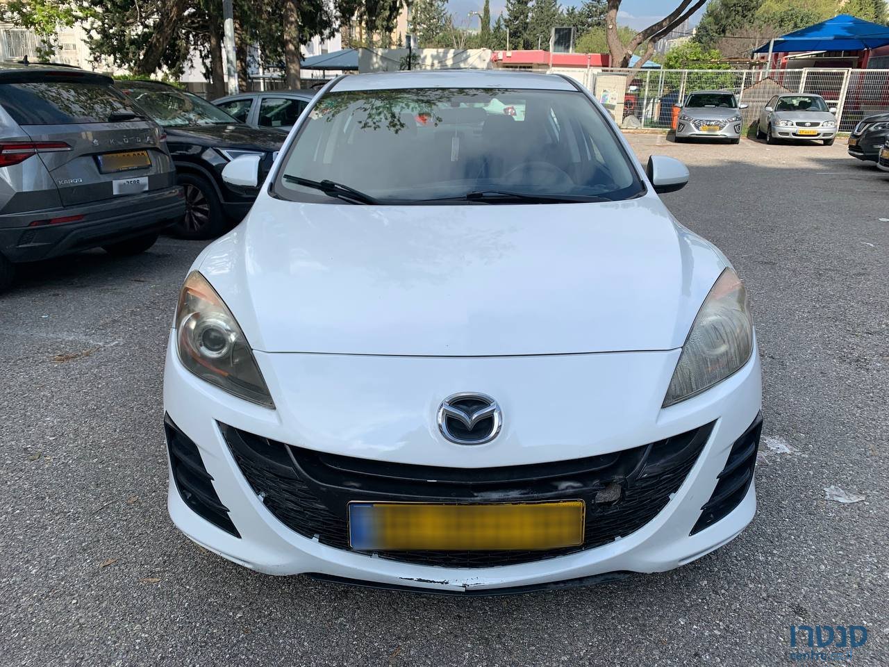 2010' Mazda Mazda3 Active photo #2