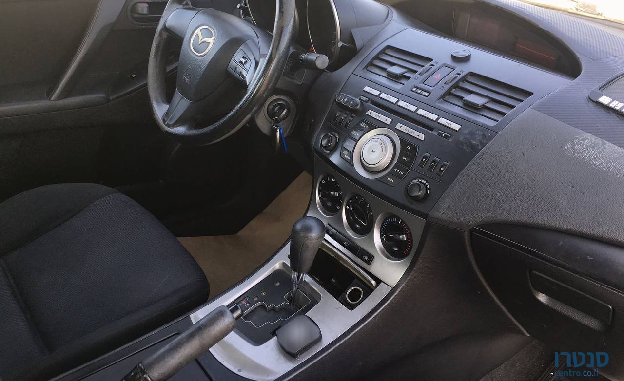 2010' Mazda Mazda3 Active photo #7