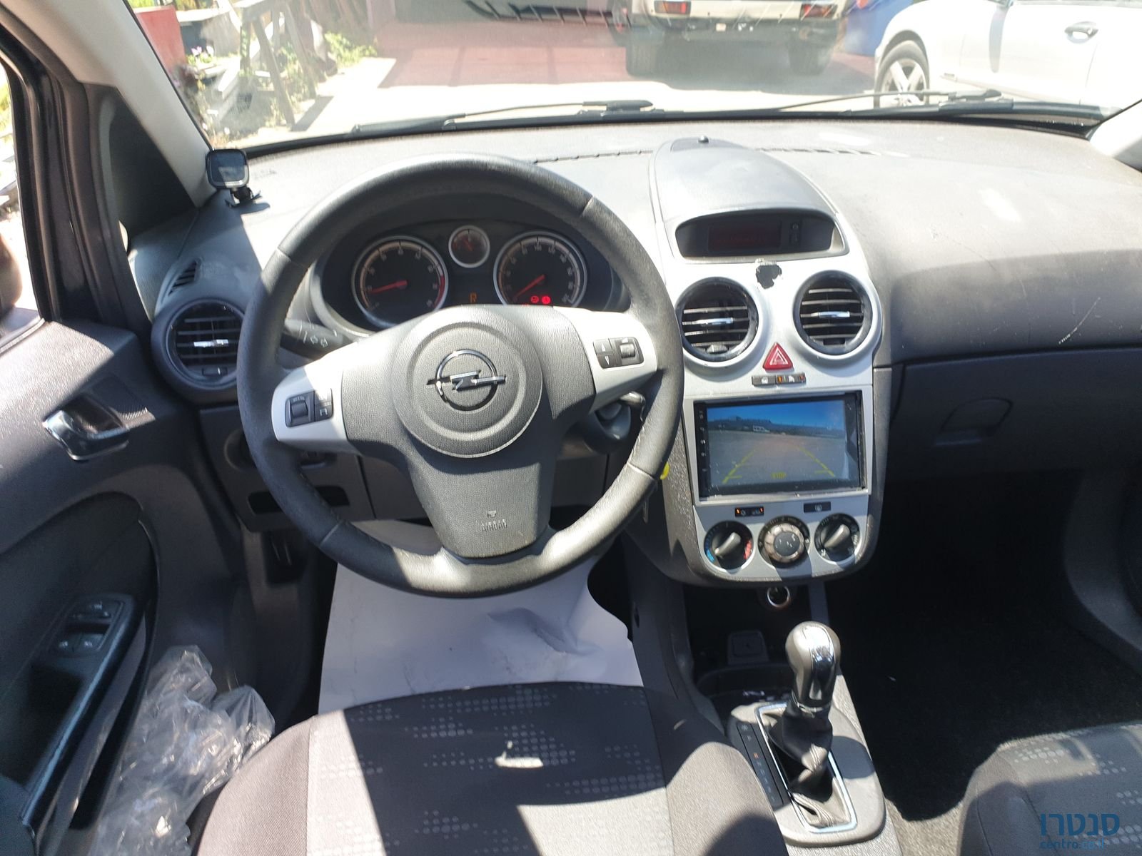 2013' Opel Corsa photo #1