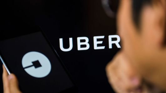 Uber lands $1 billion from SoftBank, Toyota for self-driving cars