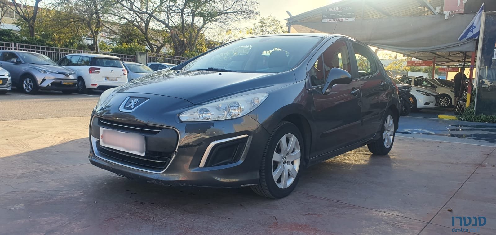 2012' Peugeot 308 photo #1