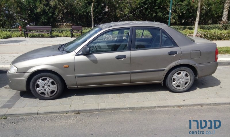 1999' Mazda 323 photo #1