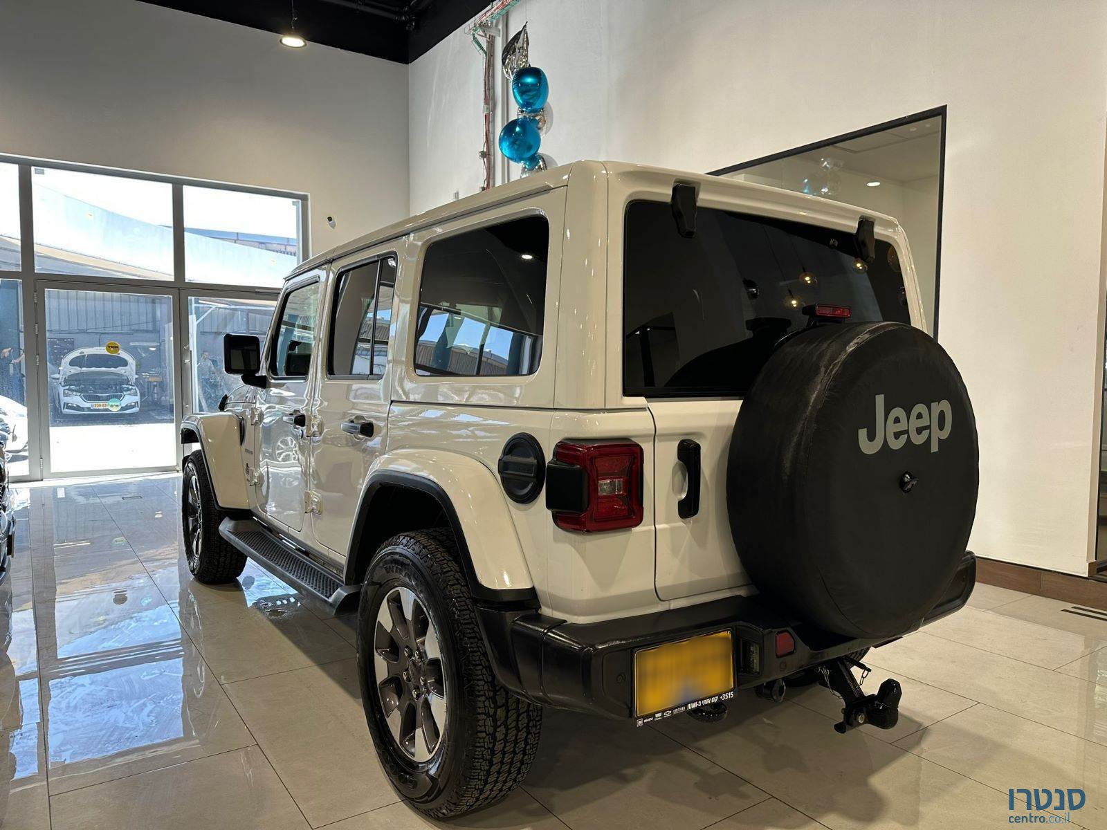 2021' Jeep Wrangler Sahara photo #4