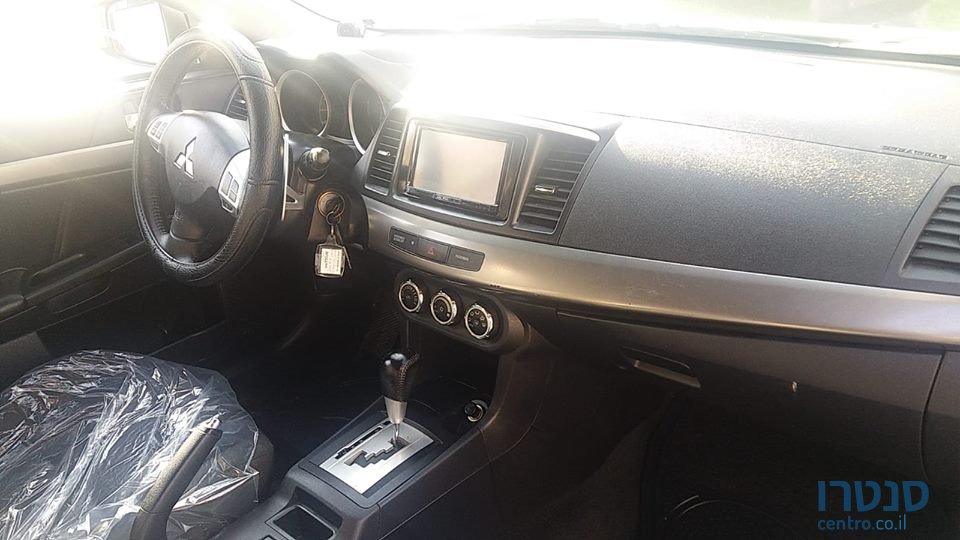 2015' Mitsubishi Lancer photo #3