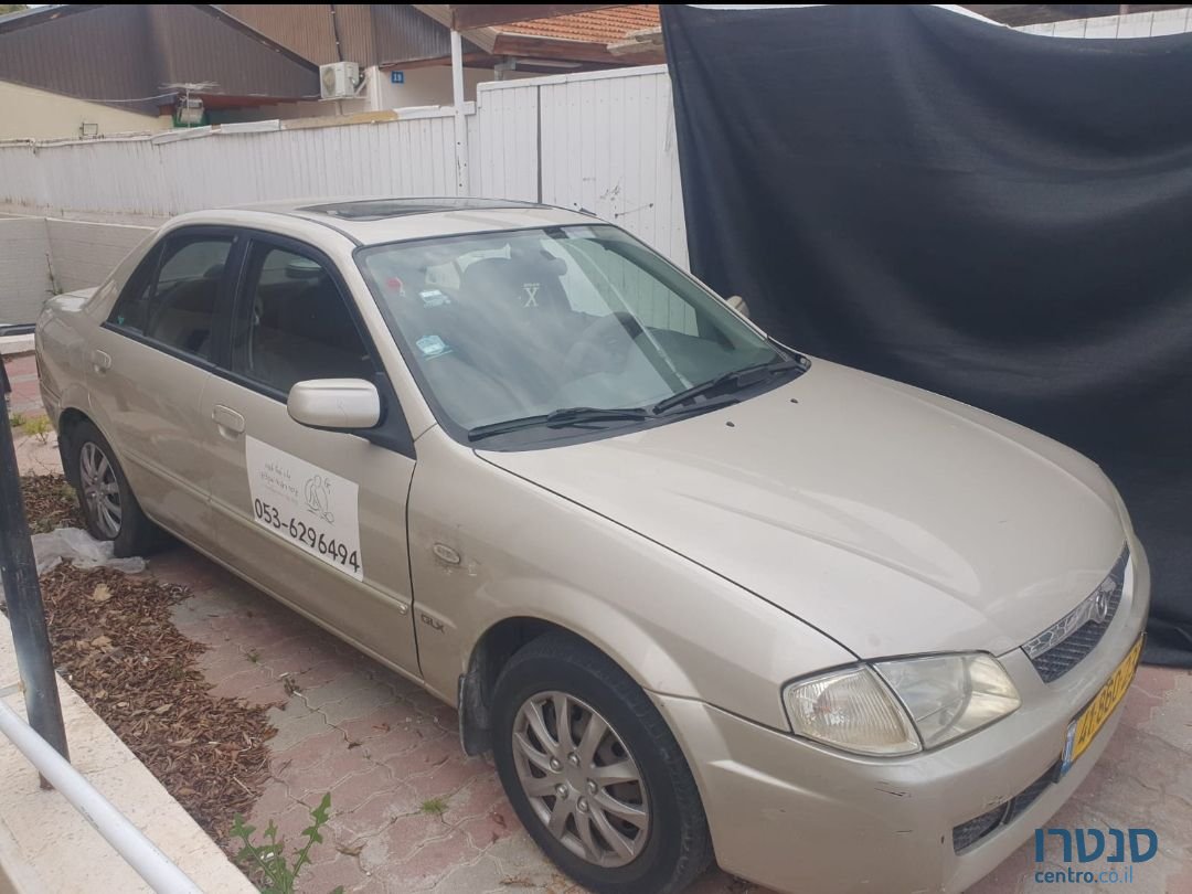 2000' Mazda 323 מאזדה לאנטיס photo #2