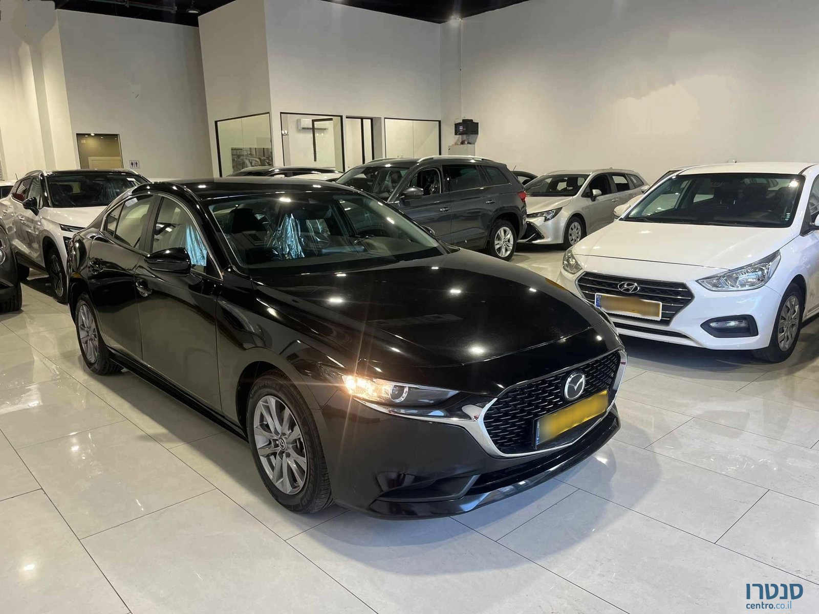 2021' Mazda 3 photo #2