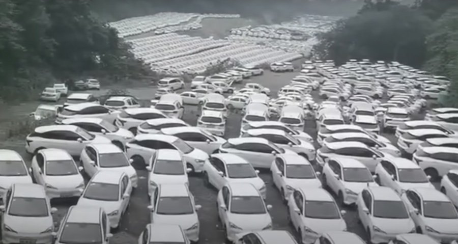 See China’s Abandoned EV Graveyard: Thousands Of Cars Rot In Huge Fields