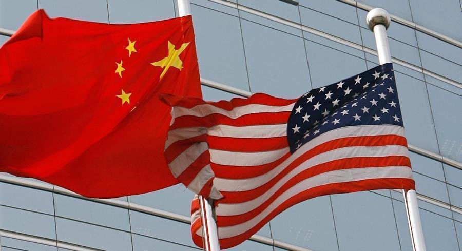 Beijing says it will fight back as Trump triples down on tariff threat