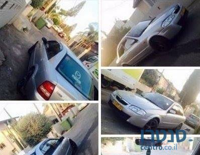 2000' Mazda 323 מאזדה 323 לאנטיס photo #1