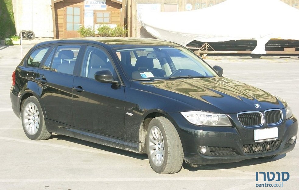 2009' BMW 318 photo #2