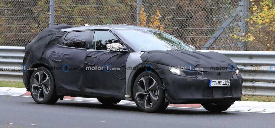 Kia's Mystery EV Crossover Spied Silently Attacking The Nurburgring