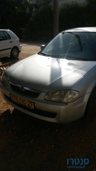 2000' Mazda 323 photo #1